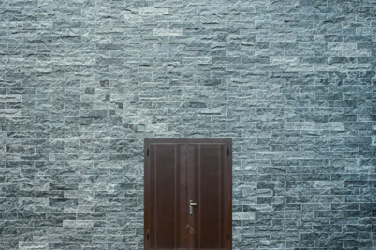 Close-up of different stone finishes polished, flamed, and tumbled granite surfaces.