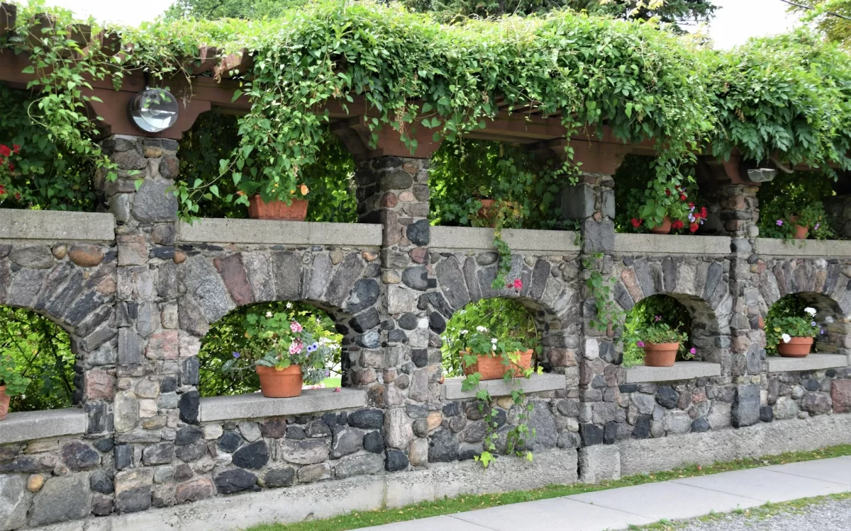 White marble planters filled with succulents on a contemporary terrace
